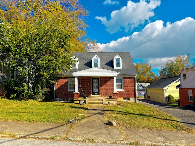 view of front of home with a front lawn