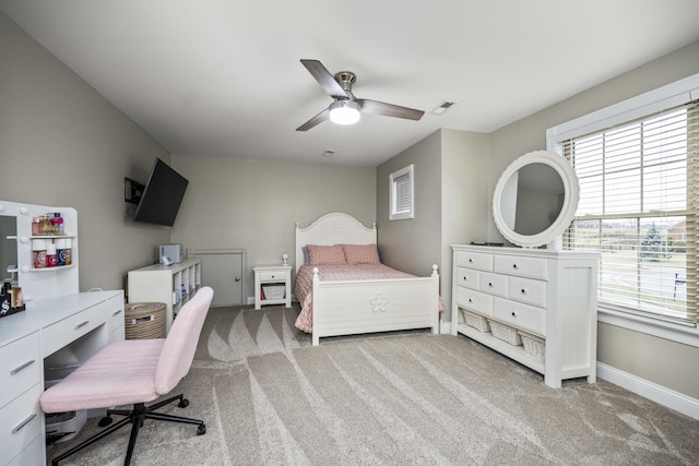 carpeted bedroom featuring ceiling fan