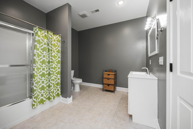 full bathroom featuring vanity, tile patterned flooring, bathing tub / shower combination, and toilet