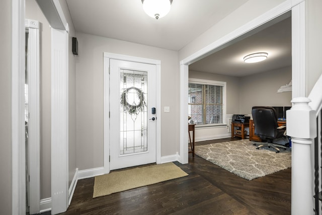 entrance foyer featuring dark hardwood / wood-style flooring