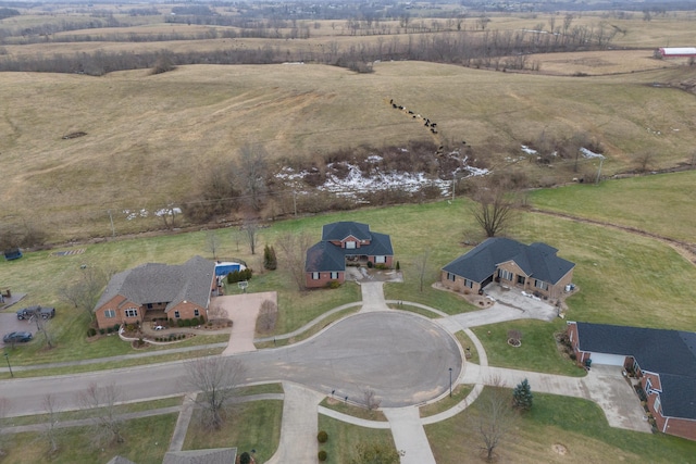 birds eye view of property featuring a rural view