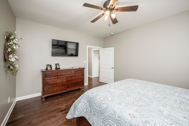 bedroom featuring dark hardwood / wood-style floors and ceiling fan