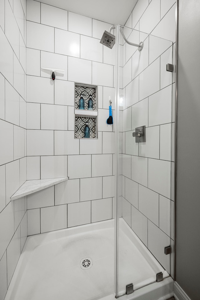 bathroom with an enclosed shower