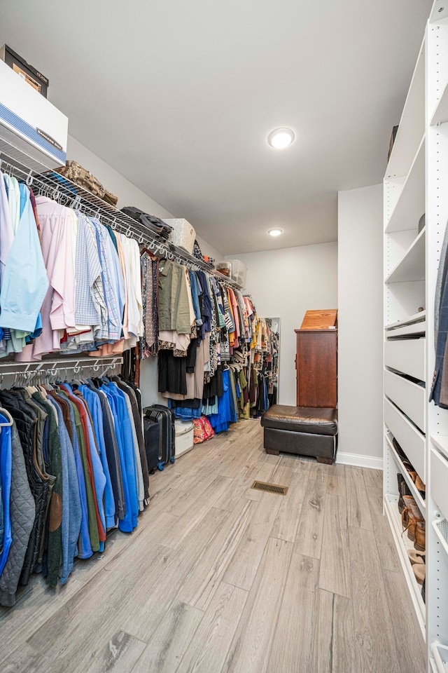 walk in closet featuring light wood-type flooring