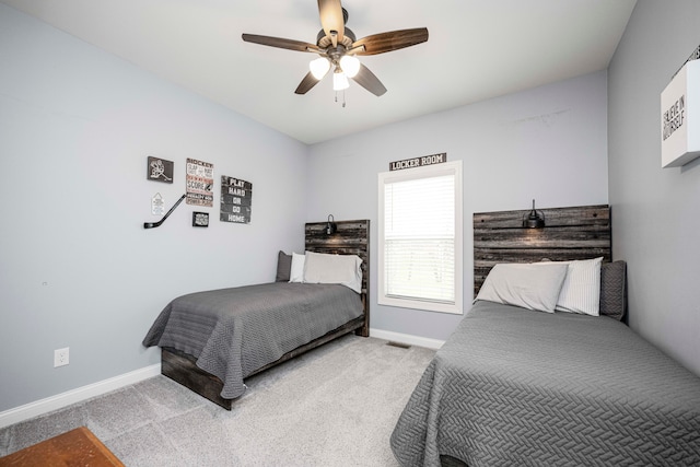 bedroom with ceiling fan and light colored carpet