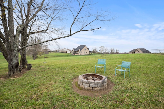 view of yard featuring a fire pit