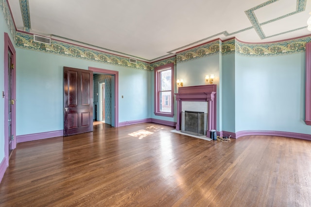 unfurnished living room with hardwood / wood-style floors