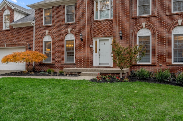 view of front of home with a front lawn