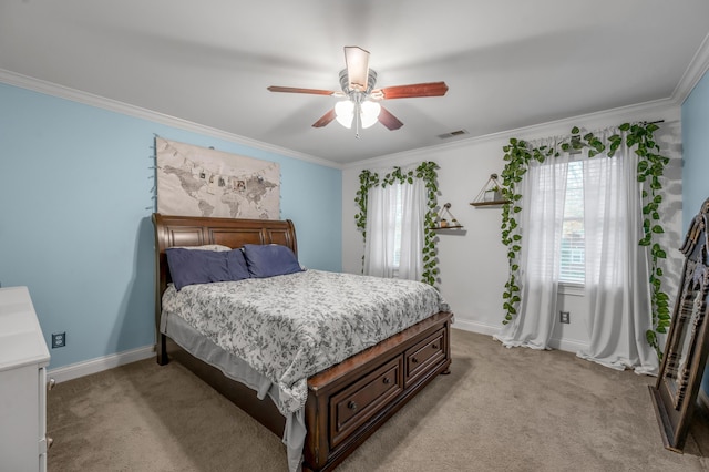 bedroom with crown molding, ceiling fan, and light carpet