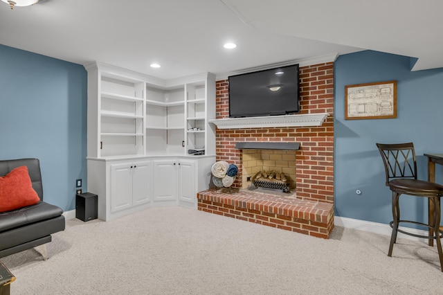 living area with a fireplace and light colored carpet