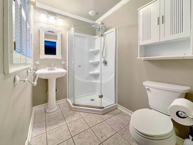 bathroom with tile patterned flooring, toilet, and walk in shower