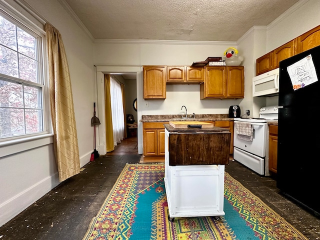 kitchen featuring a textured ceiling, dark hardwood / wood-style flooring, white appliances, and ornamental molding