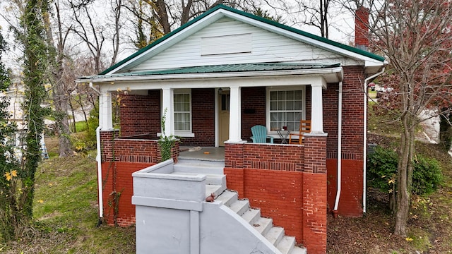 bungalow-style house featuring covered porch