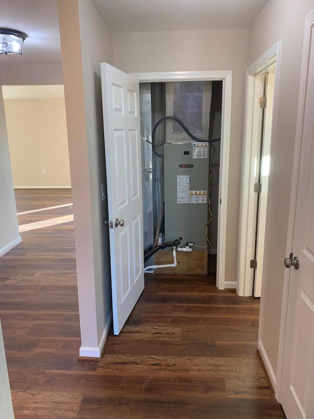 hallway featuring dark wood-type flooring