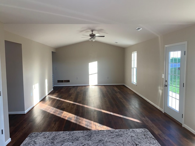 unfurnished room featuring ceiling fan, dark hardwood / wood-style flooring, and lofted ceiling