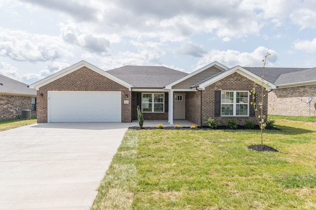 ranch-style house with cooling unit, a garage, and a front yard