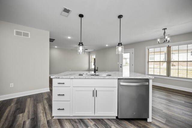 kitchen with a kitchen island with sink, dishwasher, sink, and white cabinets