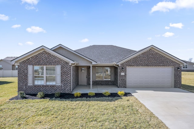 ranch-style house with driveway, fence, a front yard, a garage, and brick siding