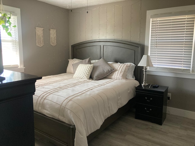 bedroom featuring hardwood / wood-style floors