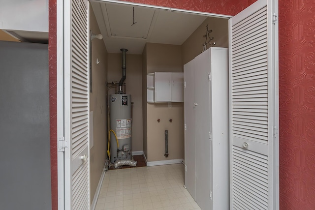 utility room featuring water heater