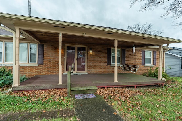 exterior space featuring covered porch