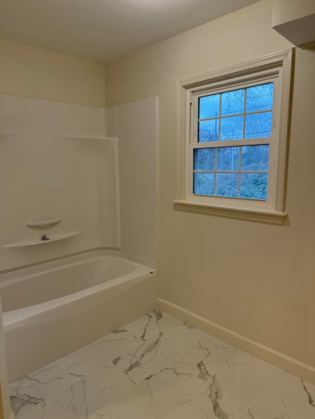 bathroom with tub / shower combination