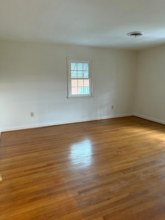 empty room featuring light hardwood / wood-style floors