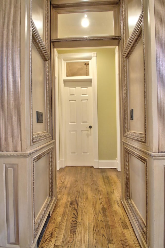 hallway featuring hardwood / wood-style floors