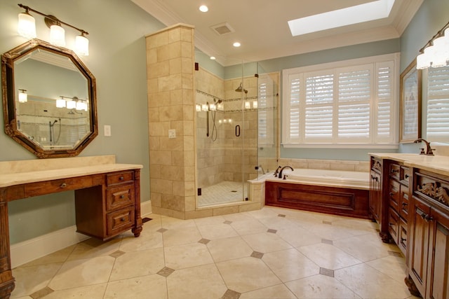 bathroom with tile patterned floors, vanity, ornamental molding, and a skylight