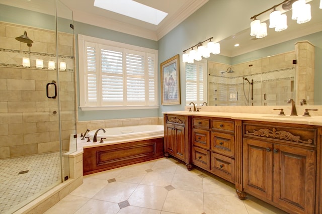 bathroom featuring a skylight, tile patterned flooring, separate shower and tub, crown molding, and vanity