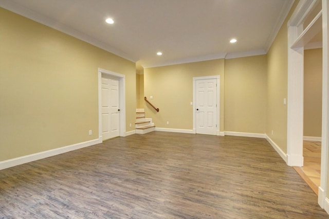 interior space featuring dark hardwood / wood-style flooring and ornamental molding