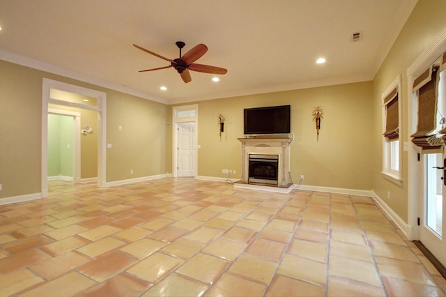 unfurnished living room with ceiling fan, light tile patterned flooring, and ornamental molding