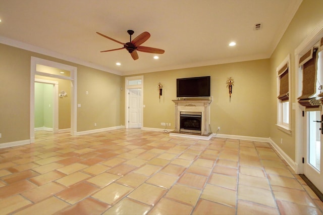 unfurnished living room with light tile patterned floors, ornamental molding, and ceiling fan