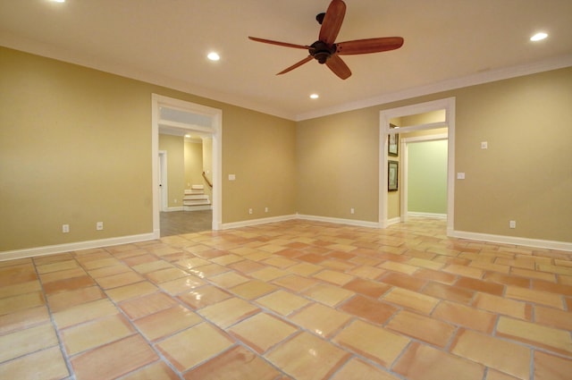 unfurnished room with ceiling fan and ornamental molding