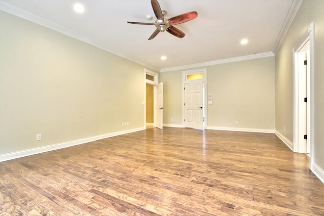 unfurnished room with ceiling fan, hardwood / wood-style floors, and ornamental molding