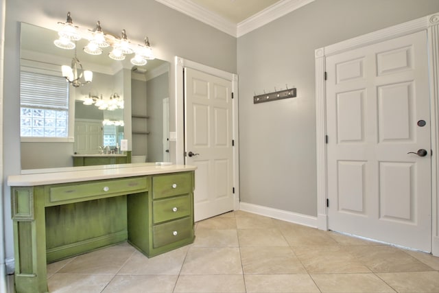 bathroom featuring a chandelier, vanity, ornamental molding, and tile patterned flooring