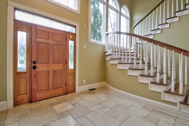 foyer featuring a healthy amount of sunlight