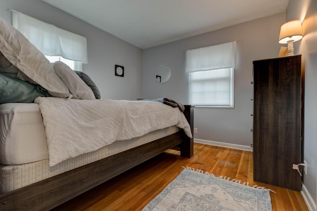 bedroom with light hardwood / wood-style floors