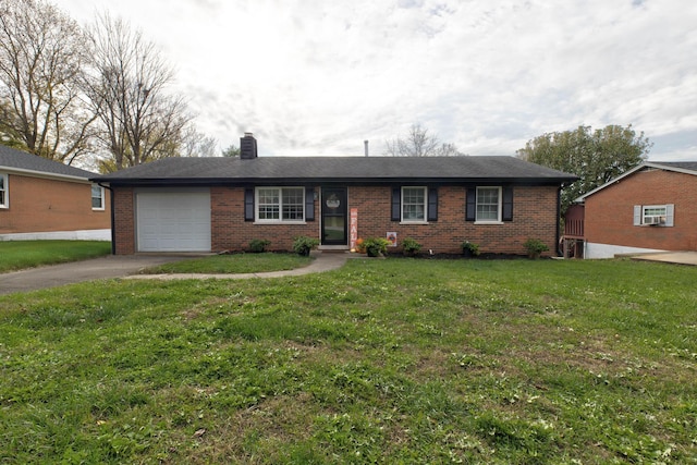 ranch-style house with a garage and a front lawn