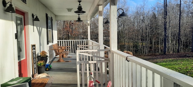 balcony featuring a porch