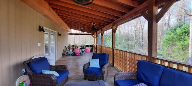 sunroom with vaulted ceiling