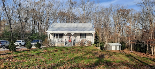 view of front of house featuring a storage unit and covered porch