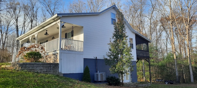 view of home's exterior with cooling unit