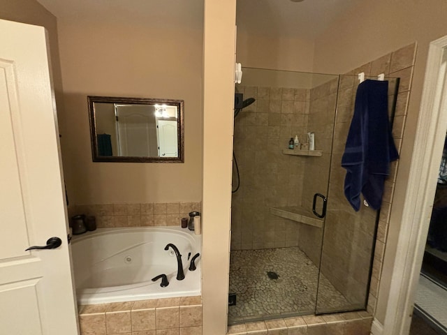 bathroom with independent shower and bath