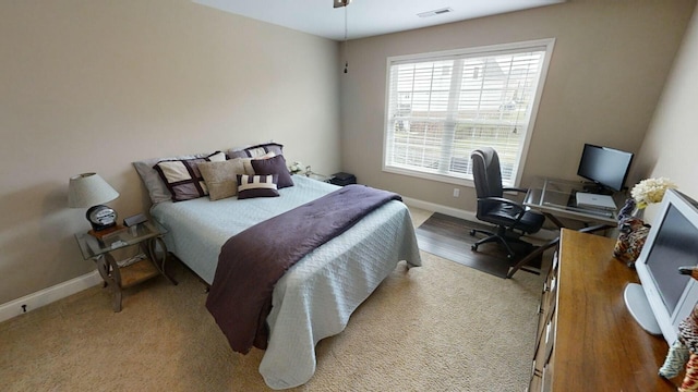 bedroom with light hardwood / wood-style floors