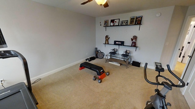 exercise area featuring carpet flooring and ceiling fan