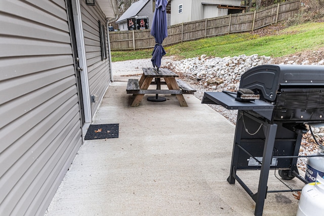 view of patio with a grill