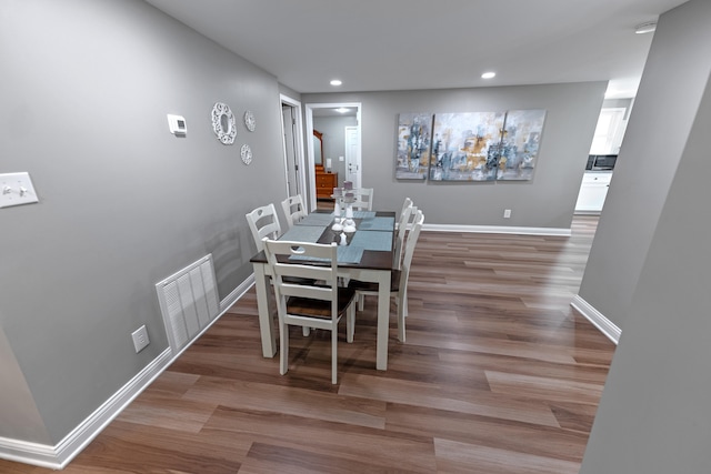 dining room featuring hardwood / wood-style floors