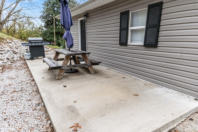 view of patio with a grill