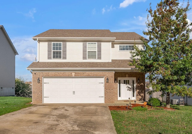 view of property with cooling unit, a front lawn, and a garage